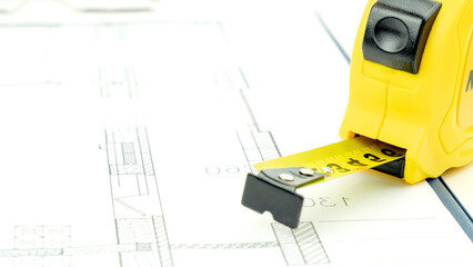 House keys and roulette on the drawings. the concept of construction and purchase of new housing