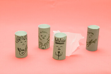 A stylized musical group made from toilet paper rolls. The concept is bad music and bad musicians.