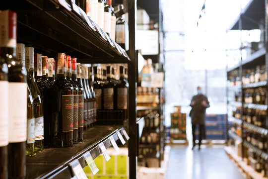Lviv, Ukraine - February 20, 2022 : Bad Boy store, shelves with wine bottles at liquor store, selective focus