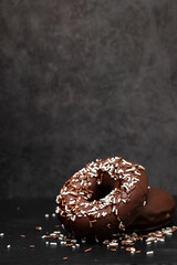 chocolate doughnut on small dish on ceramic