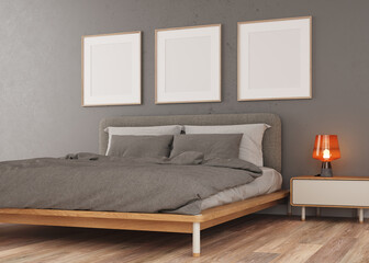 Interior design. Image 3d with dark wall contrasting with three empty canvases. Room with a dark wooden bed. Contrasts a table with a small lamp on. Light parquet. Details of textile textures