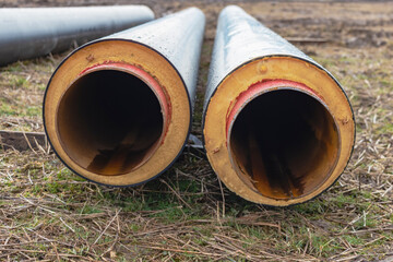 Metal pipes with thermal insulation of the district heating system for minimal heat loss....