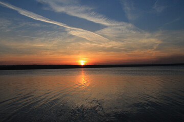 Fototapeta premium sunset over the river
