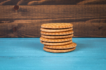 Cookies with chocolate filling. Holidays and celebrations. Wooden background