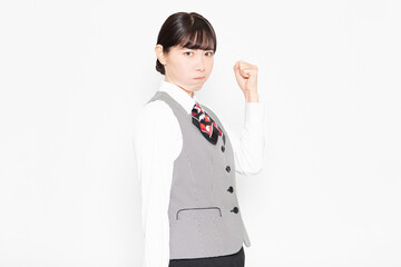 腕を振り上げて怒っているビジネスウーマン