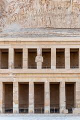 Naklejka premium A sculpture of Pharaoh at the Mortuary temple of Hatshepsut near the Egyptian city of Luxor