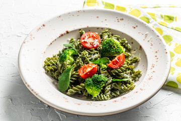 Vegetable penne pasta with spinach. proper diet. Clean eating, dieting, vegan food concept. top view