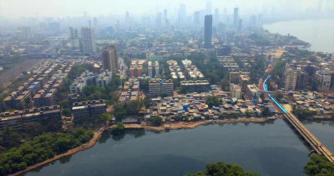 bandra kurla warli  bkc road flyover sealink western express highway india mumbai drone birds eye view cityscape mithi river .