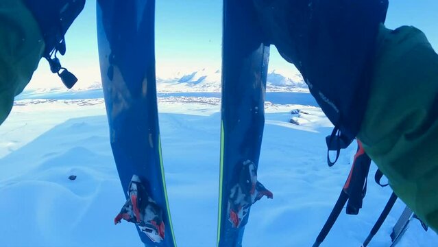 Backcountry equipment on topp of snow with scenic view, in Norway, Slow Motion