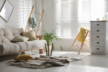 View on messy living room interior after earthquake