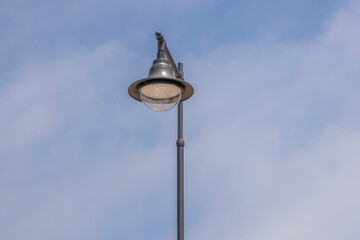 lamppost in a blue sky