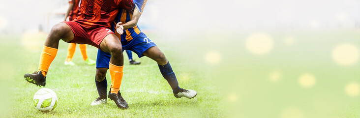 Two soccer football player dribbling a ball during match in the stadium banner design