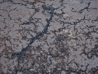wet asphalt road with crack texture