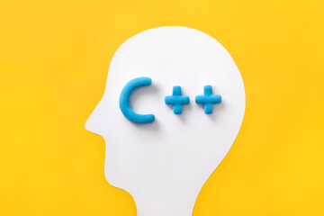 C++ programming language sign inside a humans head. Concept of programming learning, language...