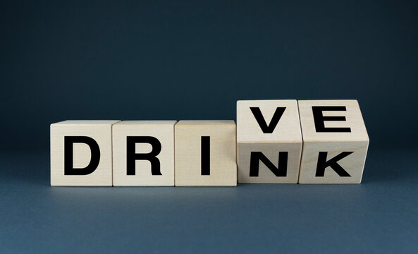 Drive or drink. The cubes form the words Drive - drink. Social problem