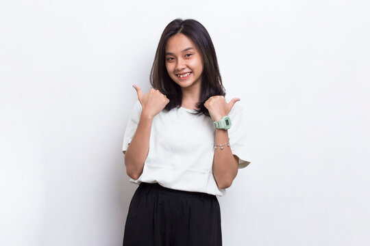 young asian beautiful woman with ok sign gesture tumb up isolated on white background
