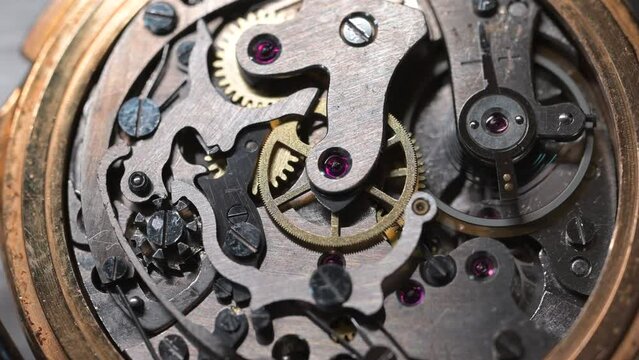 Macro of the mechanism of a clock inside.