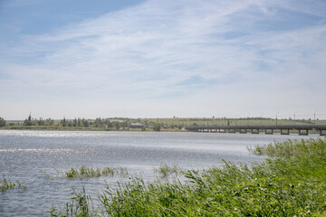 landscape with river and clouds