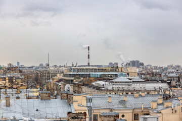 Grey roofs of the old city in the European capital on a cloudy day