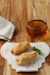 Pisang Molen, Indonesian Traditional Snack Made from RIpe Banana Wrap with Flour Pastry Batter and Deep Fried.