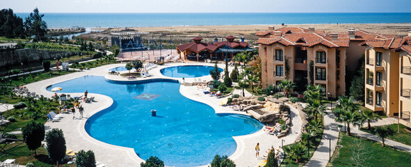Luxury hotel with swimmingpool. Turkey Antalya. Panorama. Coast. Mediterranean Sea.