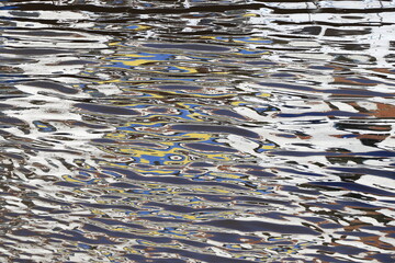 Ukrainian Flag Reflection in the Amstel River in Amsterdam, Netherlands