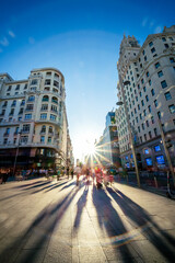 Fototapeta na wymiar Summer in the city with pedestrians shopping
