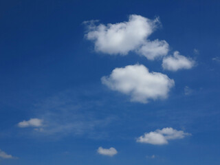 Naklejka na ściany i meble white cloud on blue sky background