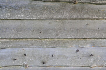 wooden background. horizontal gray board fence. surface.