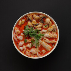 Tom yam - asian soup with seafood