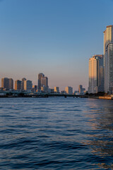 Fototapeta na wymiar 東京都江東区豊洲から見た夕方の都市景観