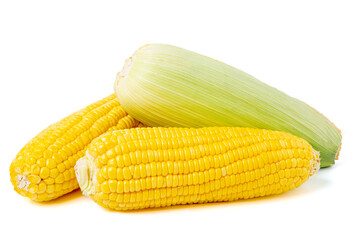 sweet corn vegetables, fresh peeled saw yellow corn kernels, piled. isolated on white background.