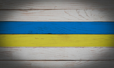 Ukraine flag on white wooden board