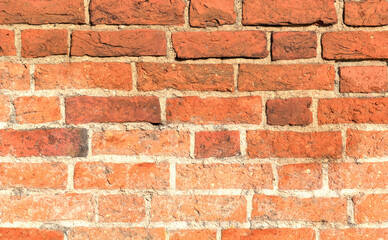 Old red brick wall close-up. Background.