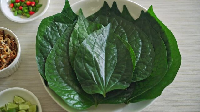 Miang kham - A royal leaf wrap appetizer - It is a traditional Southeast Asian snack from Thailand and Laos