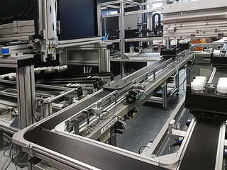 Conveyor belt in a R&D lab - obrazy, fototapety, plakaty