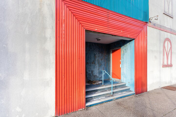 Side of colorful abandoned building left forgotten