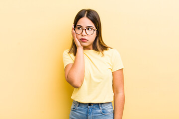 pretty hispanic woman feeling bored, frustrated and sleepy after a tiresome, dull and tedious task,...
