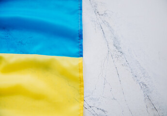 Ukrainian flag on a stone background.