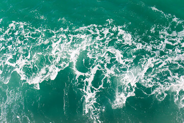 Waves bubbles ocean water background.