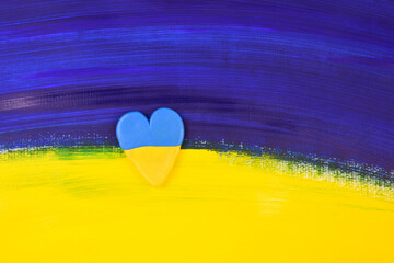 Abstract painted flag of Ukraine with heart shape stock images. Russian invasion of ukraine symbol....