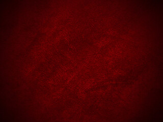 Dark red velvet fabric texture used as background. Empty dark red fabric background of soft and...