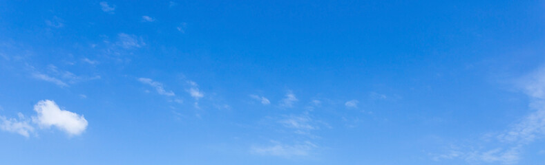 Cloudy blue sky background on sunny day