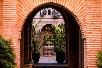 Fototapeta premium Marrakesh, Morocco - February 28, 2018: The architecture of the old Medina district of Marrakech.