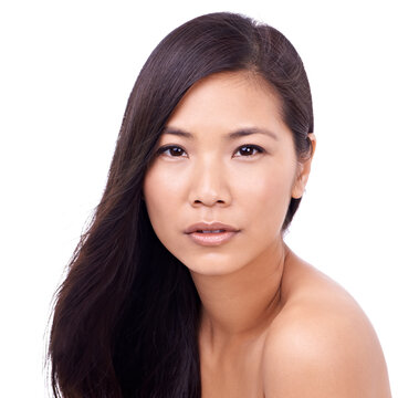 Nothing but confidence here. Cropped shot of a beautiful young oriental woman against a white background.