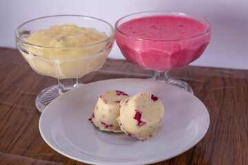 cream dessert with berries