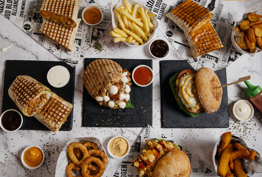 Set of fast food on table