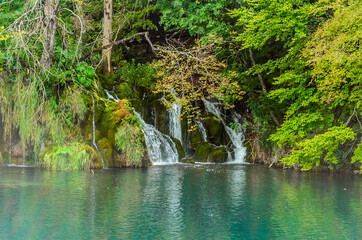 Waterfalls over the Turquoise Waters of the Mountain Lake in Plitvice Lakes National Park, Croatia