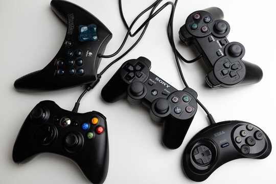 A bunch of gamepads from different game systems