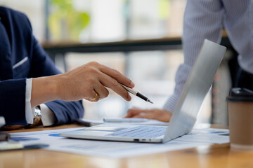 Atmosphere in the conference room where two business people are meeting and brainstorming, young executives forming startups, running new businesses and ideas. Management concept of startup company.